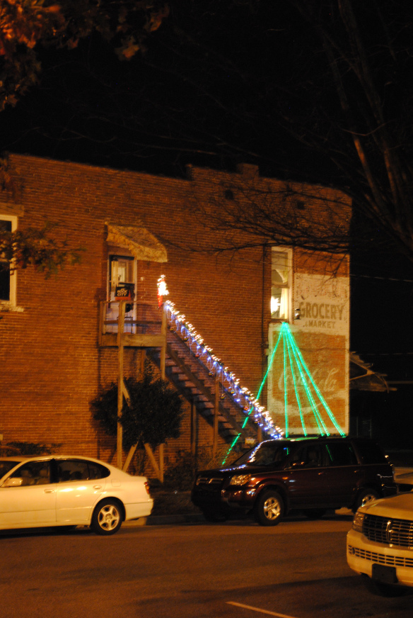 The old grocery store was decorated, lighting up the area around the restaurant.