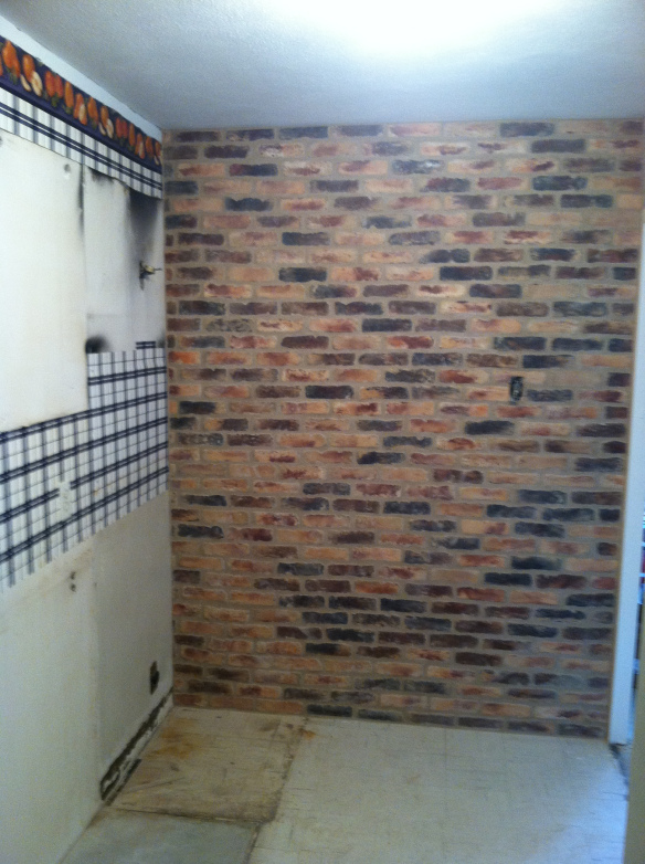 The Magpie was pleased with her idea to tile one of the kitchen walls in brick.