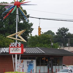 I bought a painting that reminded me of this Sputnik from outside Joe's Liquors in midtown Memphis. As HGTV would say, it was my "Inspiration" Source:joeswines.blogspot.com
