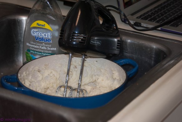 Using the kitchen sink as a countertop to mash potatoes for shepherd's pie